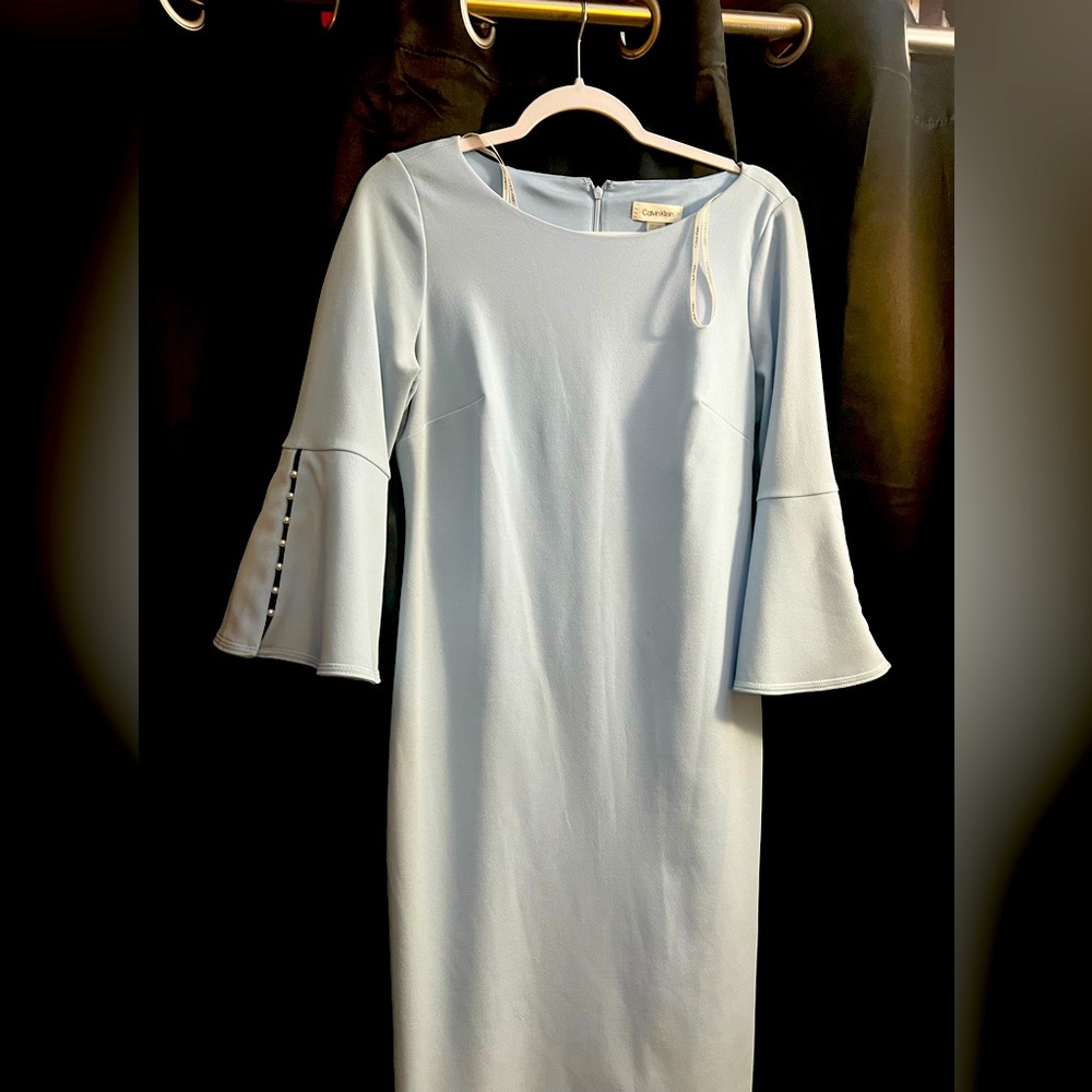 Beautiful bell sleeved size 10 baby blue dress
